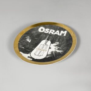 Piatto decorativo Osram di Fornasetti, 1970 ca.